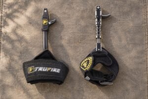 Tru-Fire Patriot and Smoke Extreme wrist strap releases side by side